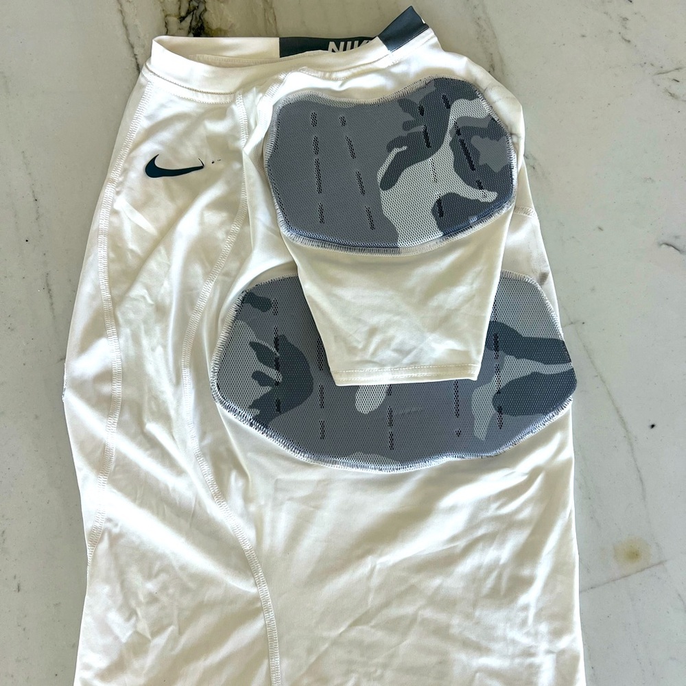 Nike Pro hyperstrong compression padded shirt.